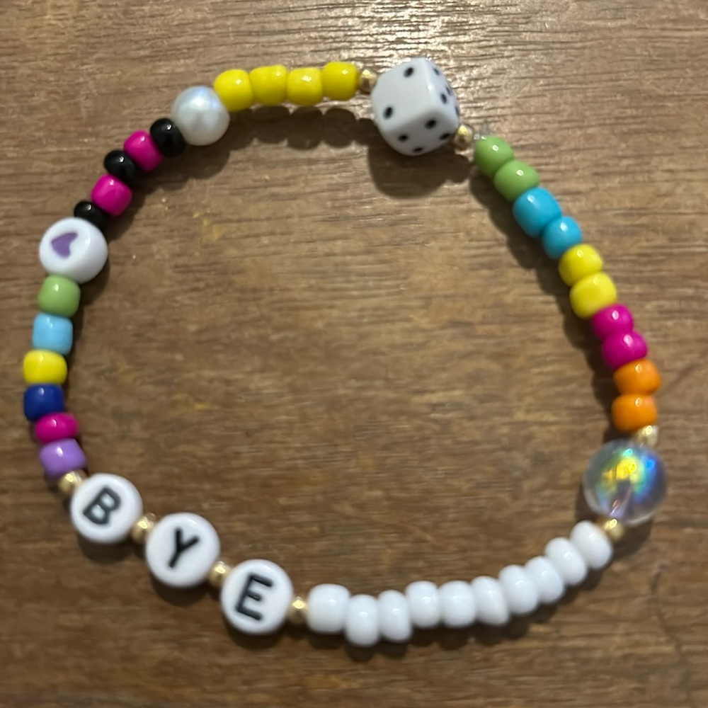 Homemade bracelet. Stretch elastic. Multi colored. Glass seed bead.
